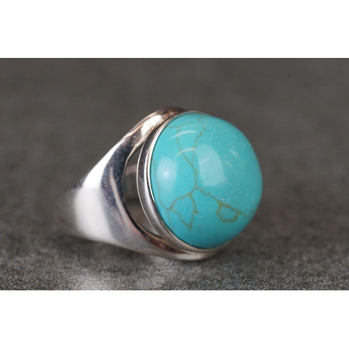 217 - Silver ring with large cabochon turquoise stone