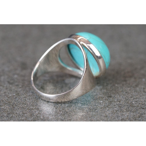 217 - Silver ring with large cabochon turquoise stone