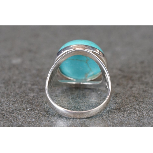 217 - Silver ring with large cabochon turquoise stone