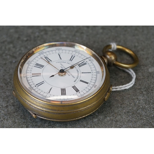 220 - A early 20th century brass cased centre seconds chronograph pocket watch.