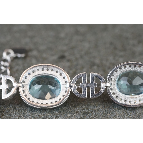 225 - Silver, CZ & blue topaz bracelet