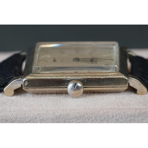 228 - A vintage gents Longines wristwatch with original strap.