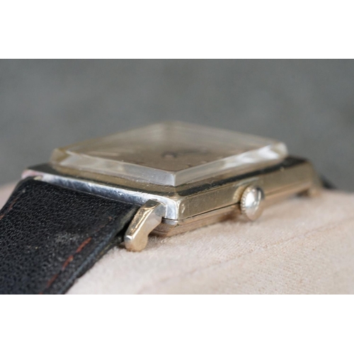 228 - A vintage gents Longines wristwatch with original strap.