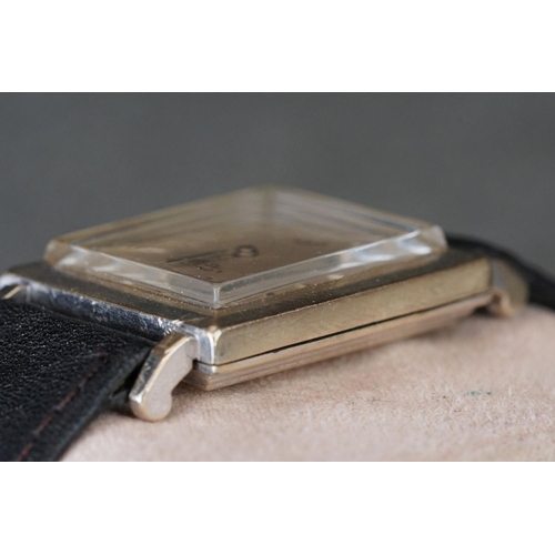 228 - A vintage gents Longines wristwatch with original strap.