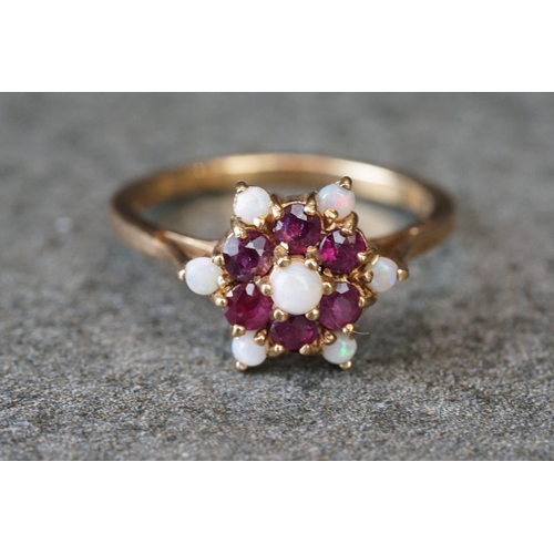 230 - Two ladies hallmarked 9ct gold dress rings with ruby, opal and diamonds.