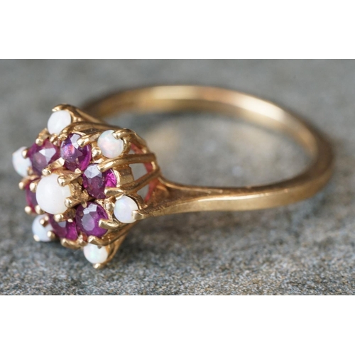 230 - Two ladies hallmarked 9ct gold dress rings with ruby, opal and diamonds.