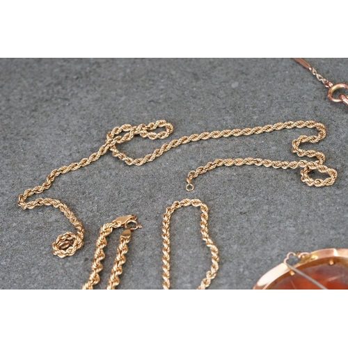 231 - A collection of yellow gold jewellery to include necklace, bracelet, brooch and Albert chain.