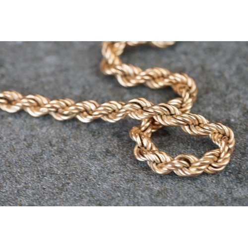 231 - A collection of yellow gold jewellery to include necklace, bracelet, brooch and Albert chain.