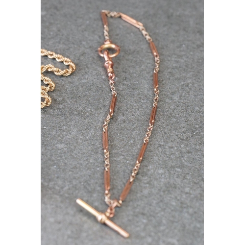 231 - A collection of yellow gold jewellery to include necklace, bracelet, brooch and Albert chain.