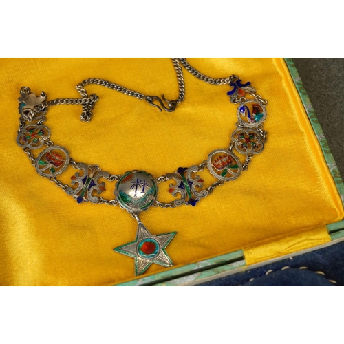 233 - A vintage indian silver and enamel necklace together with a similar bracelet, a 3d coin bracelet and... 