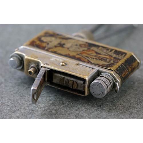 234 - A Japanese novelty table lighter in the form of a camera together with a miniature oriental teapot.