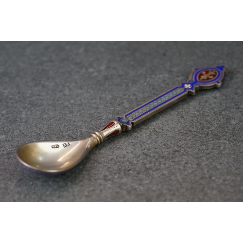 235 - A hallmarked Russian silver and enamel decorative spoon.