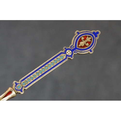 235 - A hallmarked Russian silver and enamel decorative spoon.