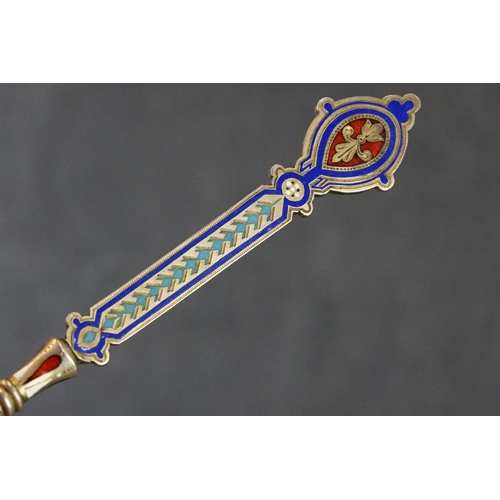 235 - A hallmarked Russian silver and enamel decorative spoon.
