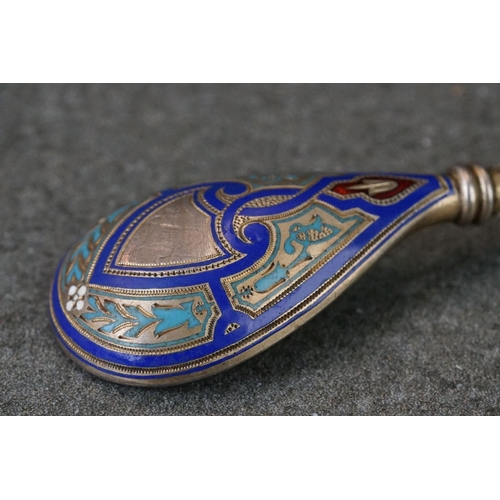235 - A hallmarked Russian silver and enamel decorative spoon.
