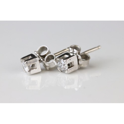 194A - Pair of diamond 18ct white gold stud earrings, round brilliant cut diamond weighing approx 0.25 cara... 