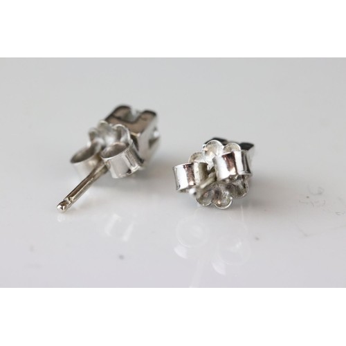 194A - Pair of diamond 18ct white gold stud earrings, round brilliant cut diamond weighing approx 0.25 cara... 
