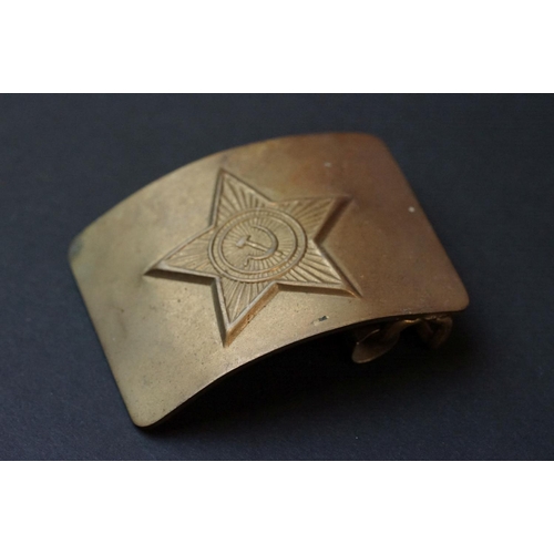 32 - A Small Group Of Military Collectables To Include A Brass Russian Military Belt Buckle, A Lucite Hea... 