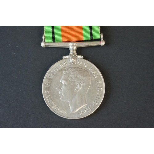 5 - A Full Size British World War Two Medal Pair To Include The 1939-1945 British War Medal And The Defe... 