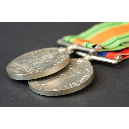 5 - A Full Size British World War Two Medal Pair To Include The 1939-1945 British War Medal And The Defe... 