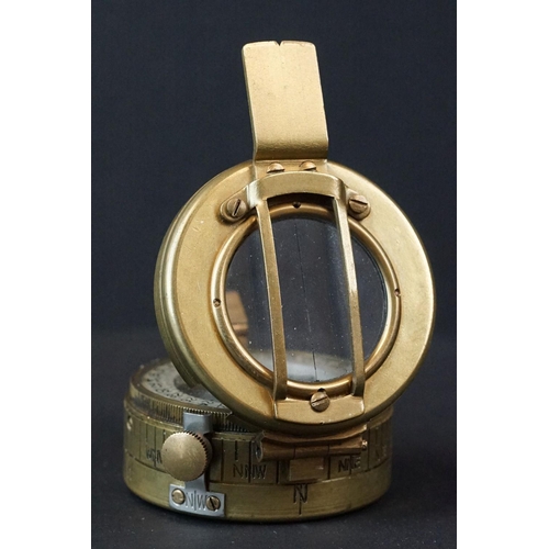 64 - A World War Two British Military Marching Compass, Dated 1943 And Made By T.G.Co Ltd. London And Mar... 