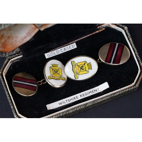 67 - A Pair Of The Wiltshire Regiment Cased Cufflinks With Enamel Decoration.