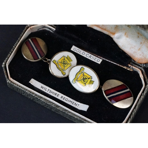 67 - A Pair Of The Wiltshire Regiment Cased Cufflinks With Enamel Decoration.