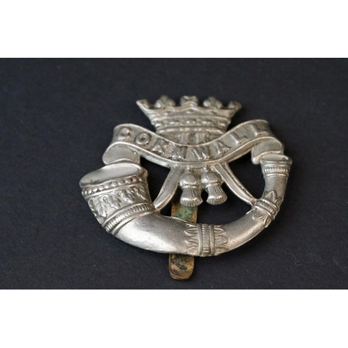 76 - A Small Group Of Military Collectables To Include A Duke Of Cornwall Light Infantry Cap Badge And A ... 