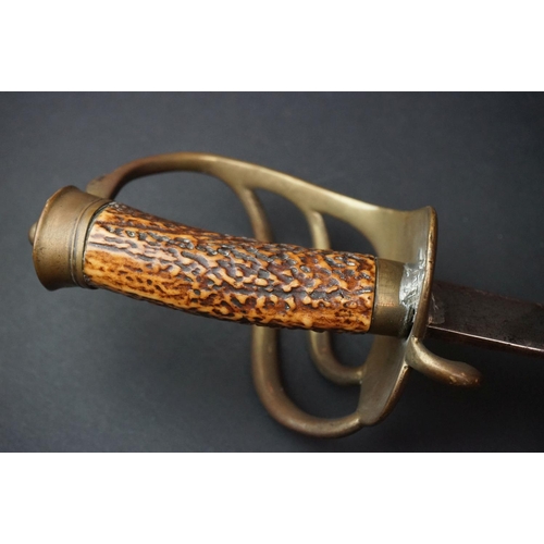 180 - An Antique 18th / 19th Century Short Sword With Antler Grip And Brass Basket.