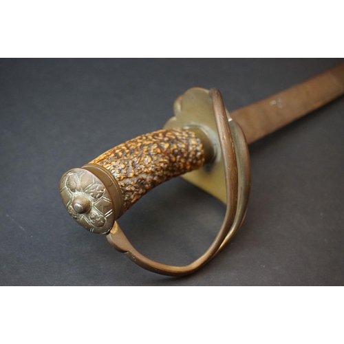 180 - An Antique 18th / 19th Century Short Sword With Antler Grip And Brass Basket.