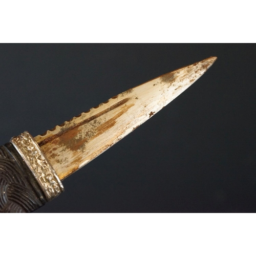 81 - A Scottish Sgian-Dubh Dagger With Fitted Sheath With Thistle Decoration To White Metal.