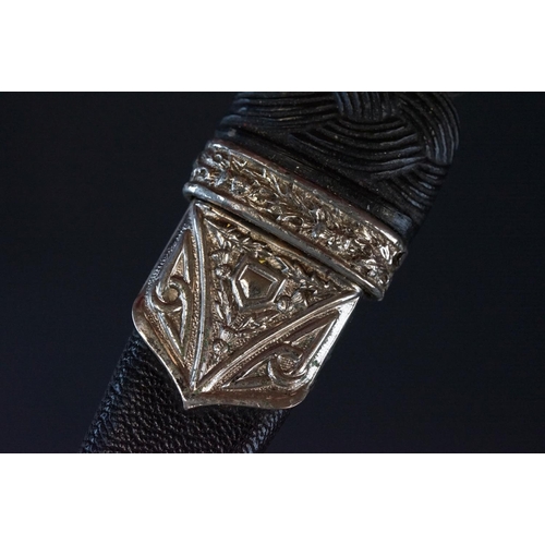 81 - A Scottish Sgian-Dubh Dagger With Fitted Sheath With Thistle Decoration To White Metal.