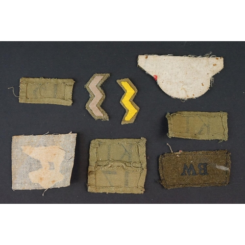 83 - A Collection Of Approx Twenty Military Cloth Badges To Include Fire Guard Armband, WW2 Medal Bar And... 