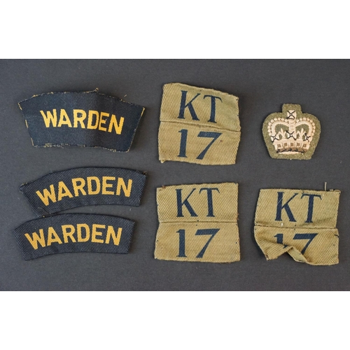 83 - A Collection Of Approx Twenty Military Cloth Badges To Include Fire Guard Armband, WW2 Medal Bar And... 