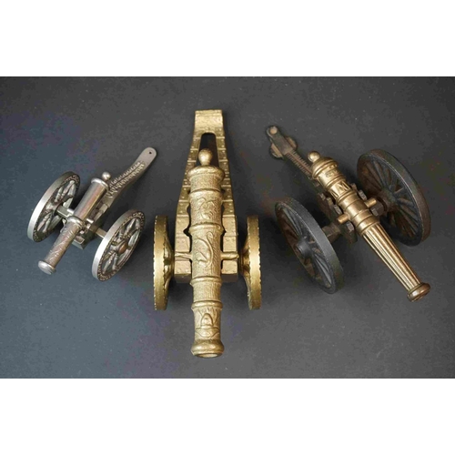 192 - A Collection Of Three Ornamental Metal Canon's To Include A Silver Plated Example.