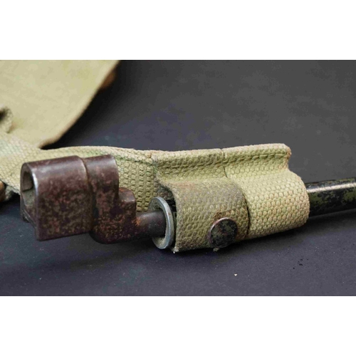 201 - A British World War Two Webbing Belt With A No.4 MK.II Lee Enfield Spike Bayonet With Frog And Scabb... 