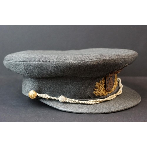 126 - A Collection Of Three Military Caps To Include A British Royal Logistics Corps Cap Complete With Cap... 