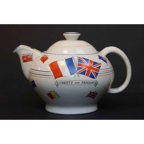 356 - A White China Teapot With Transfer Printed “Liberty And Freedom” And Various Commonwealth Flags. The... 