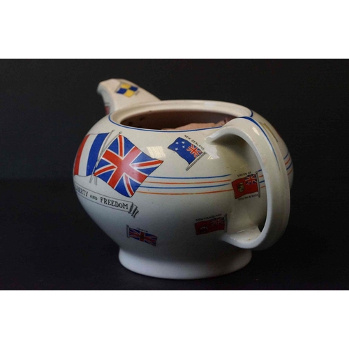 356 - A White China Teapot With Transfer Printed “Liberty And Freedom” And Various Commonwealth Flags. The... 