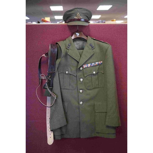 357 - A British Military Royal Artillery Officers Uniform To Include Jacket, Trousers, Cap And Belts.