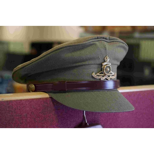 357 - A British Military Royal Artillery Officers Uniform To Include Jacket, Trousers, Cap And Belts.