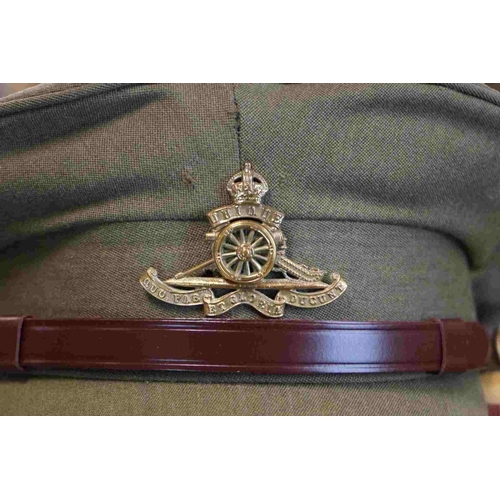 357 - A British Military Royal Artillery Officers Uniform To Include Jacket, Trousers, Cap And Belts.