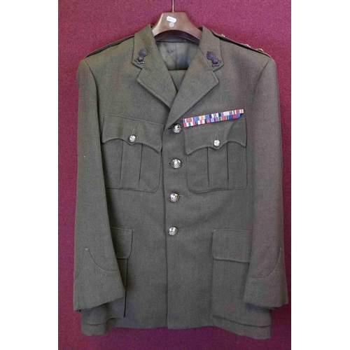 357 - A British Military Royal Artillery Officers Uniform To Include Jacket, Trousers, Cap And Belts.