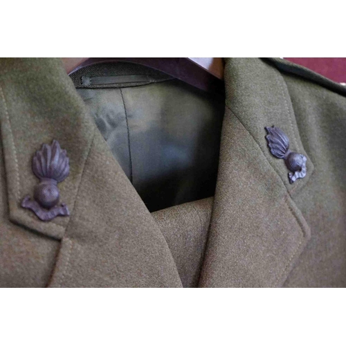 357 - A British Military Royal Artillery Officers Uniform To Include Jacket, Trousers, Cap And Belts.