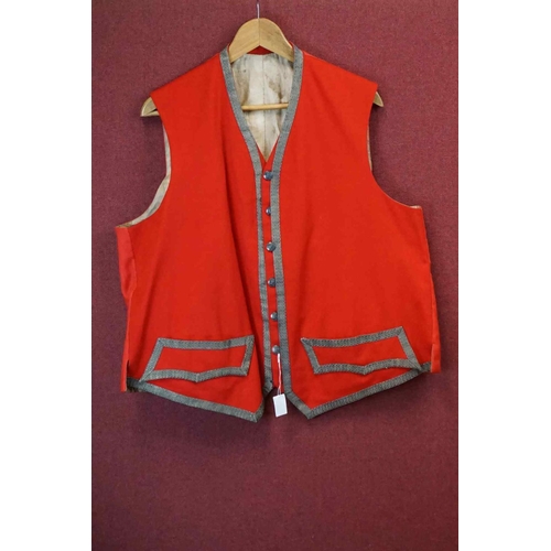 415 - An Early Military Red Waistcoat With Silver Braiding.