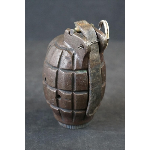 115A - A British World War One Inert Mills Grenade, Marked W L Complete With Clip And Pin.