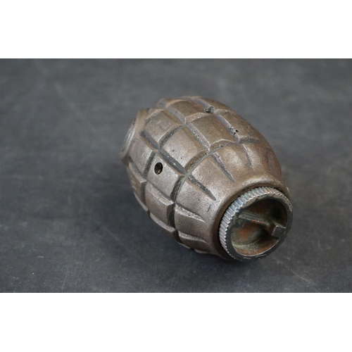 115A - A British World War One Inert Mills Grenade, Marked W L Complete With Clip And Pin.