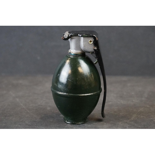 130A - A British L30A2 Drill Grenade Complete With Clip And Pin.