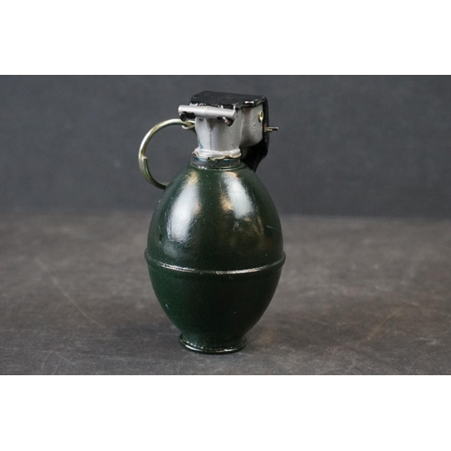 130A - A British L30A2 Drill Grenade Complete With Clip And Pin.