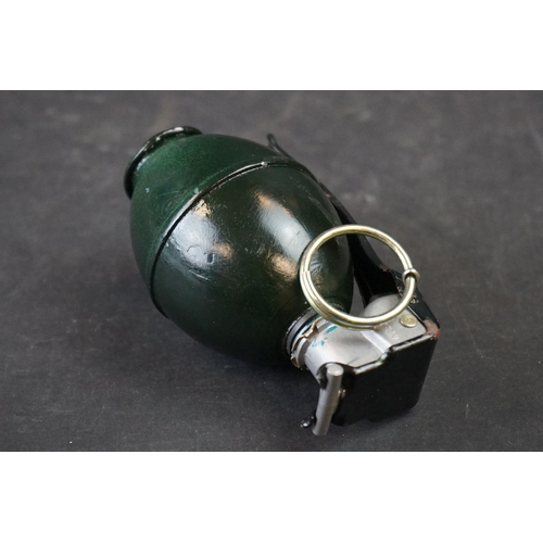 130A - A British L30A2 Drill Grenade Complete With Clip And Pin.